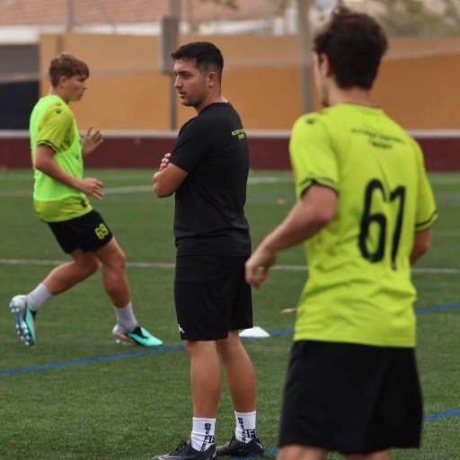 a football coach observing players during a training session for what do football scouts look for in 11 year olds