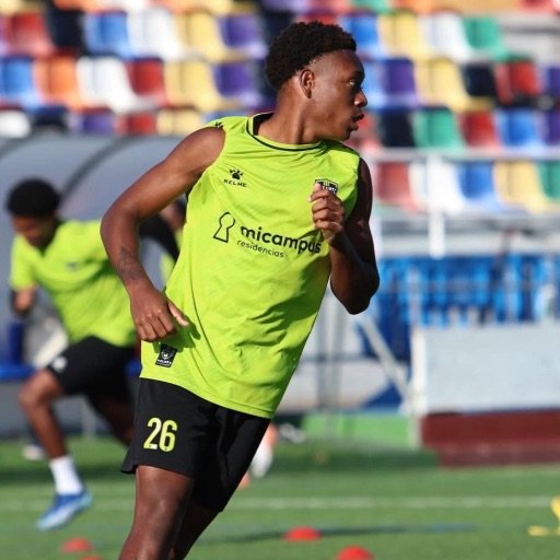 a youth football player sprinting during training for best football academy in the world