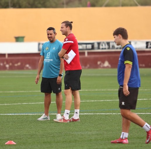 football scout taking notes scouting report