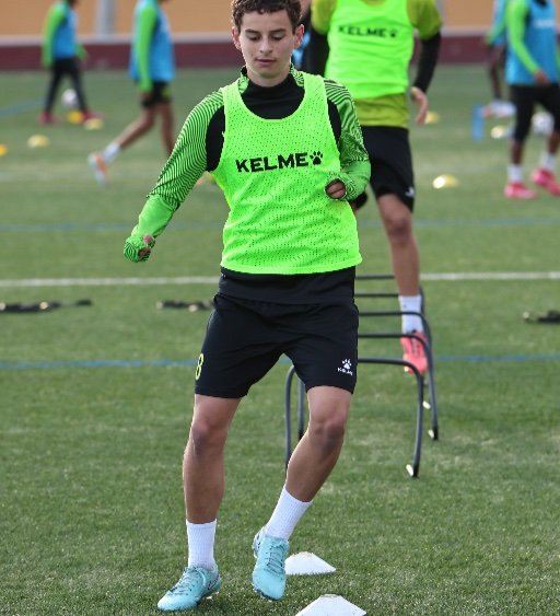 academy players training in spain with coaches