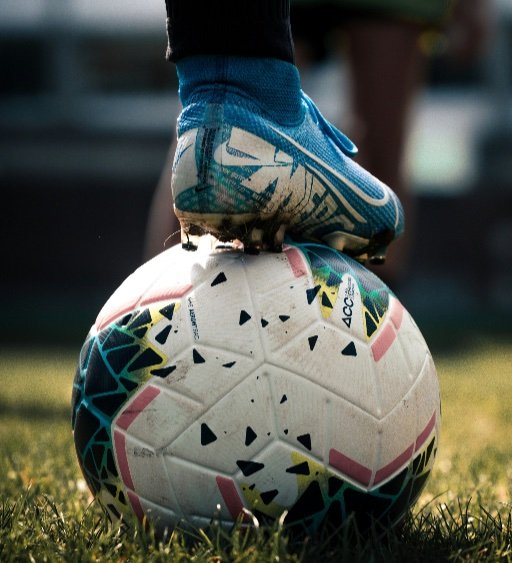 football boot on ball for first touch control