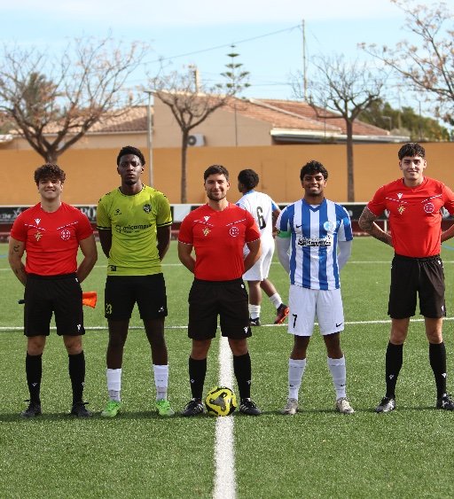 football players competing in trial match
