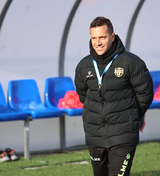 football scout watching youth match