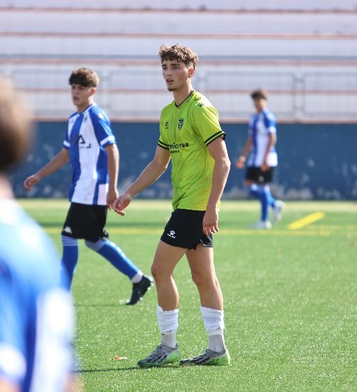 academy players competing in a match during a Spain football trial week