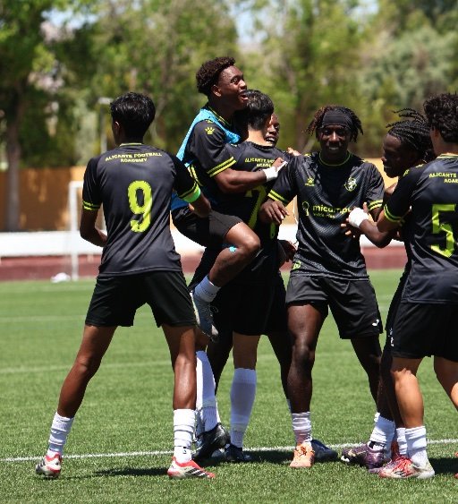 academy vs club soccer players celebrating with teammates