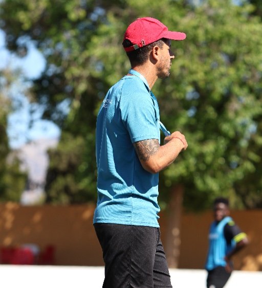 alicante football academy coach leading football training drills