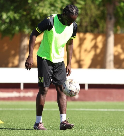 soccer academy player controlling ball during training