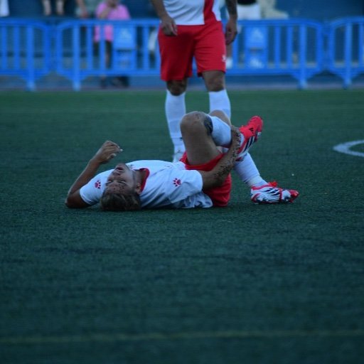 football trial match player down after a challange